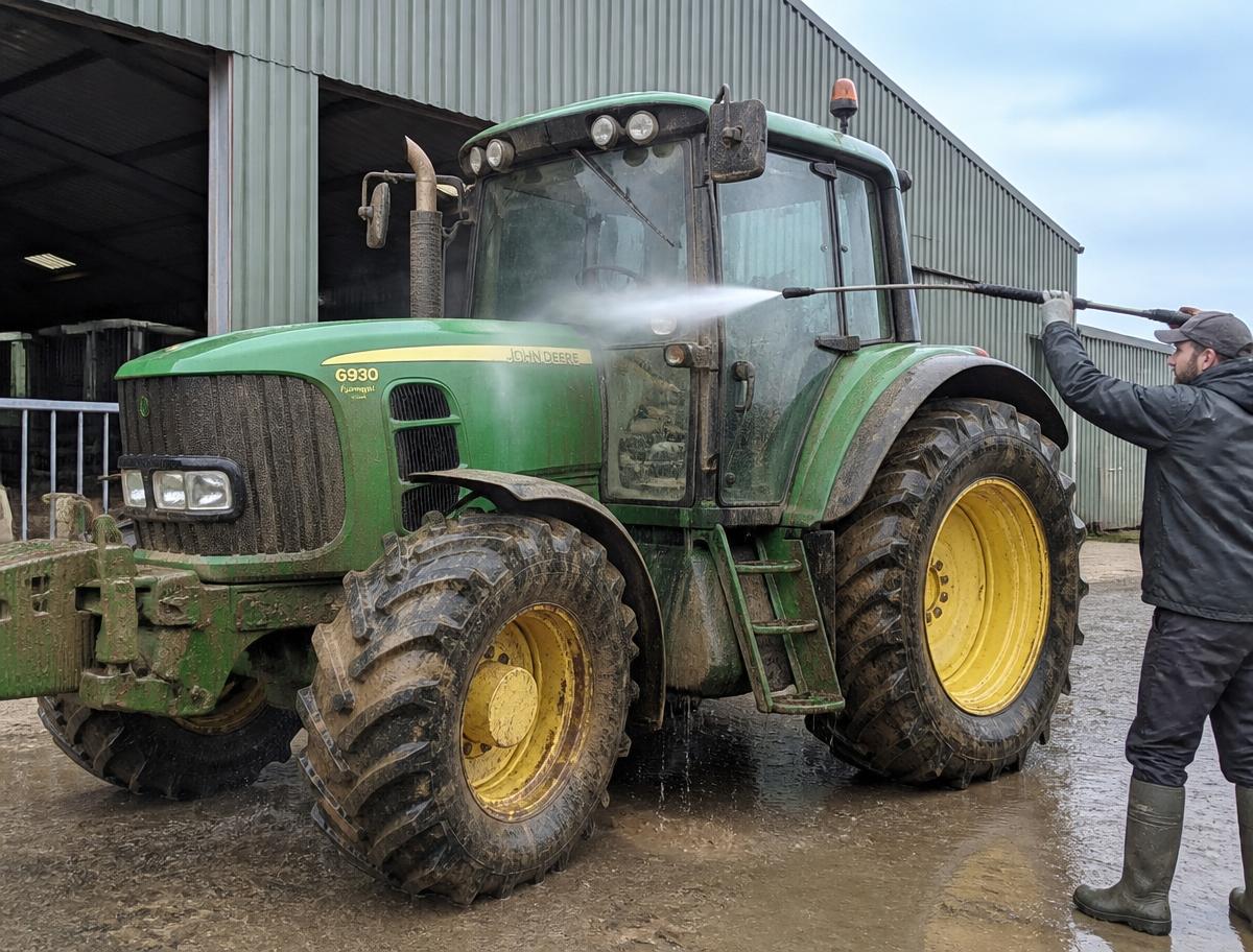 Farming equipment cleaned with a pressure washer